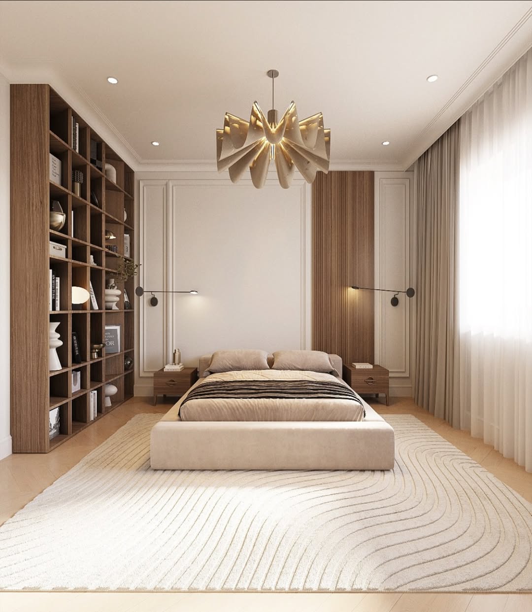 Modern bedroom with neutral tones, a low upholstered bed, large bookshelf, patterned rug, pendant light, and floor-to-ceiling curtains letting in natural light—perfect inspiration for stylish bedroom decor.