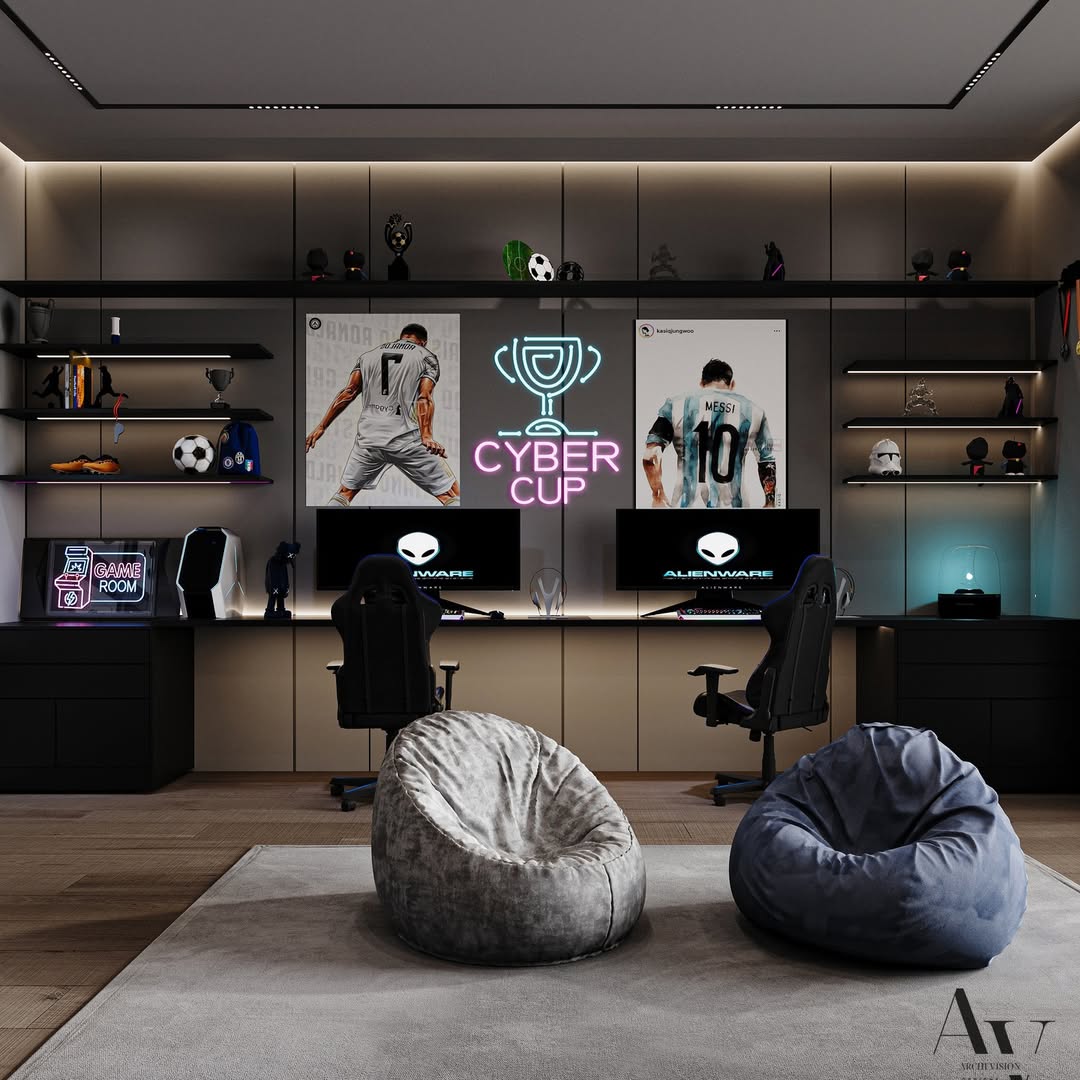 A modern gaming room setup featuring two advanced gaming setups, a large screen displaying “Cyber Cup,” cozy bean bag chairs, shelves with sports and gaming items, and ambient lighting—perfect for exploring the latest gaming room ideas.